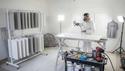 Professional cabinet painting process in Modesto, CA showing smooth spray finish on kitchen cabinets