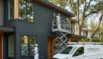 Professional siding painting on a Modesto CA home by expert exterior house painters